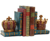 Two poly-resin bookends with ornate antique finish. One bookend displays a crown on top of a stack of books, and the other has a crown on top of a single book.