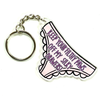 Keychain shaped like a pair of underwear with text on a white background