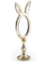 Decorative mirror with rabbit ears on a white background