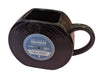 Black mug with a vinyl record design 